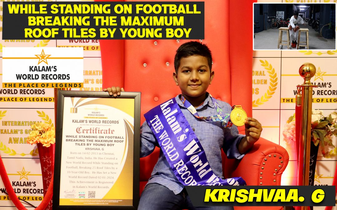 While Standing on Football Breaking the Maximum Roof Tiles by Young Boy